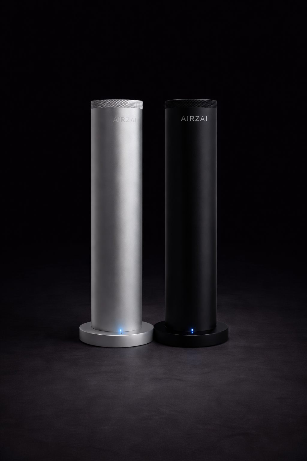 Halo diffusers in silver and black against a dark backdrop